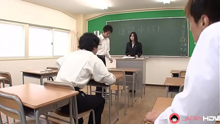 Two Asian dudes get down on the sluts wet pussy