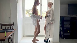 Standing doggy with long haired boy and shaved bald head girl