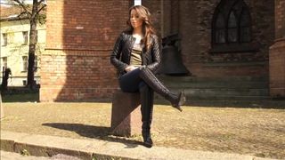 Brunette wearing a leather jacket and kneehigh leather boots - part 1