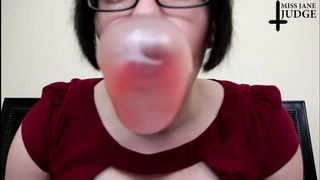 Bubble gum babe blows big bubbles