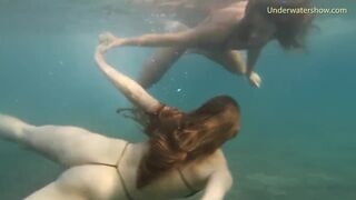 Nude teen babe swims on Tenerife